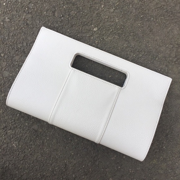Charming Charlie Handbags - Charming Charlie Ivory Clutch